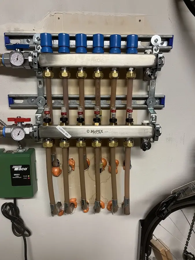 Plumber performing Water Heater Repair at a residential property in Stayton